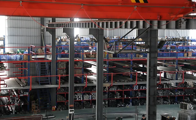 Profile racks and overhead lifting equipment inside the Hengbo workshop