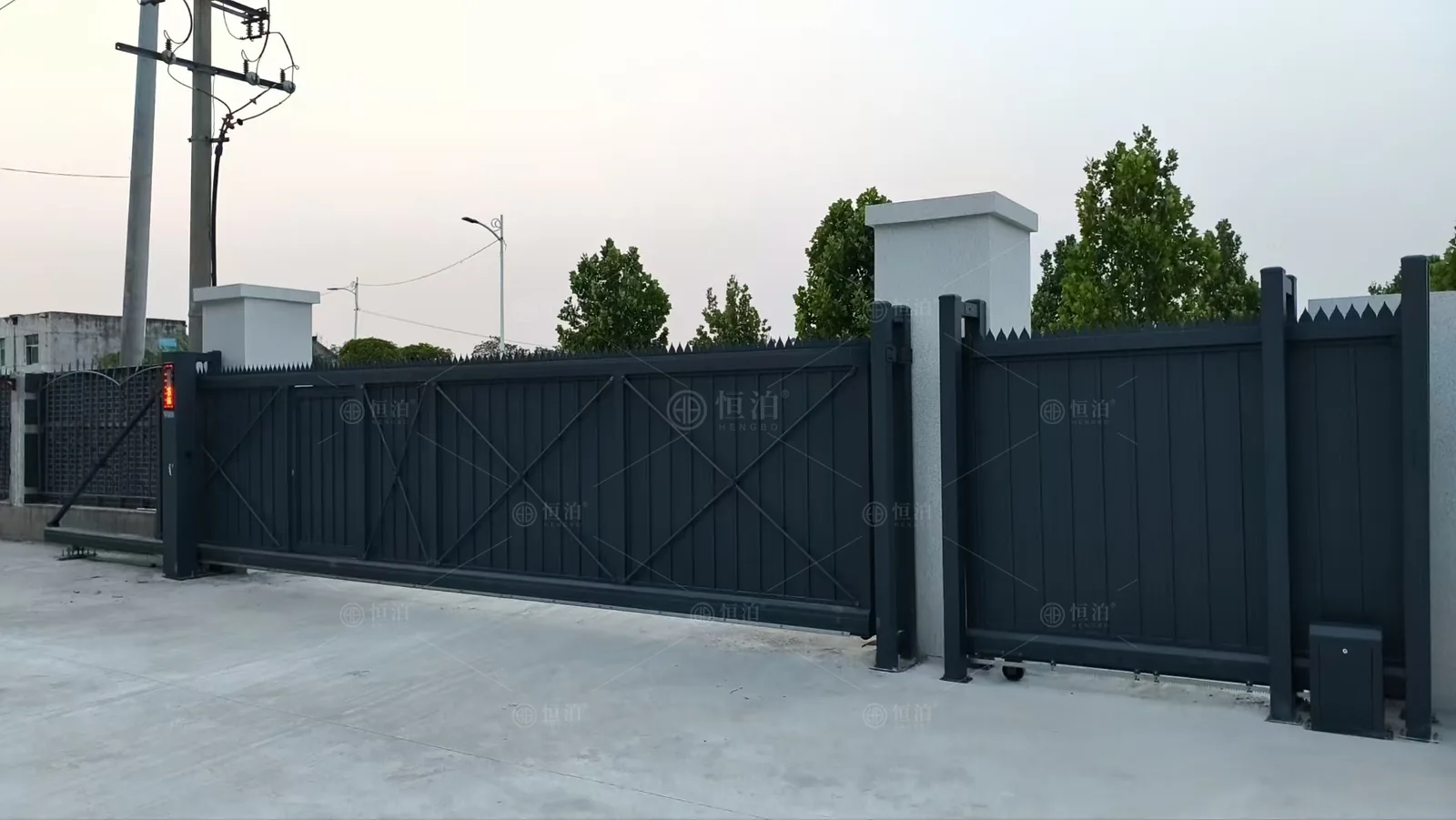 A screened vehicle gate with a side door — Ludwigshafen, Germany.