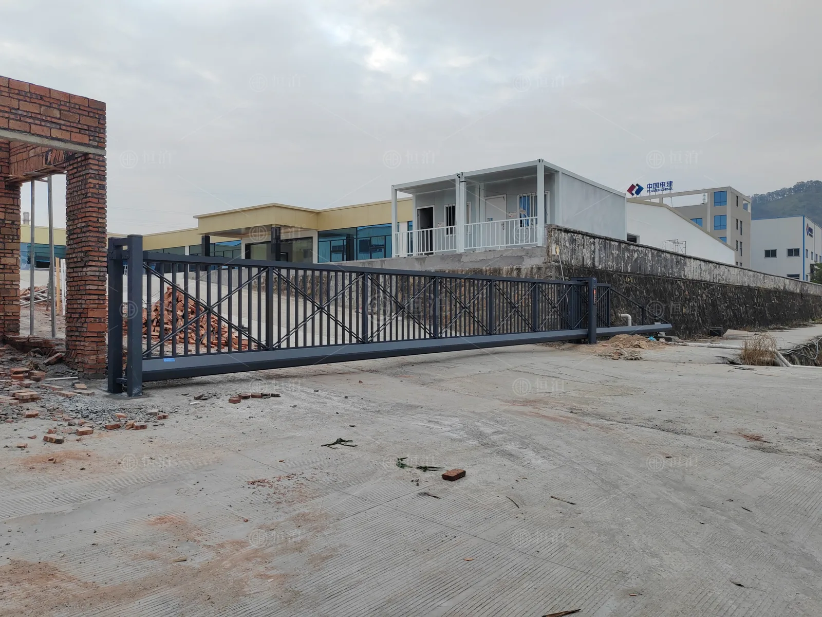 Two gate arrangements within a factory compound — Ashburn, United States.